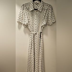 New! Never worn.Collared White/Black polka for dress with sleeves. Gorgeous fit